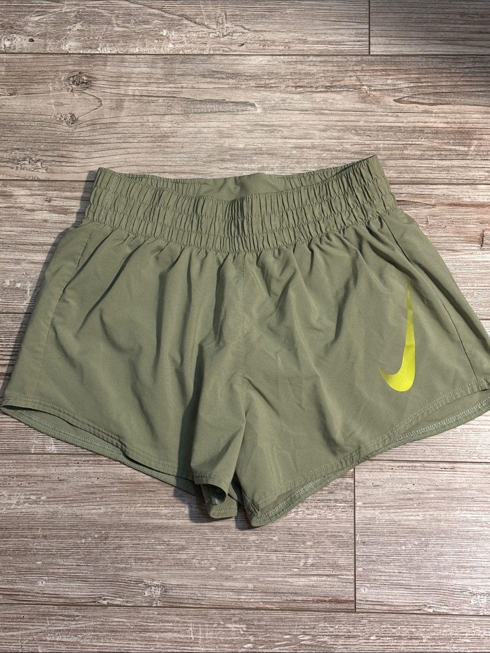 Nike Women’s Olive Athletic Shorts with Neon Yellow Swoosh